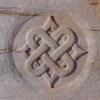 Celtic knot carved into a door panel.